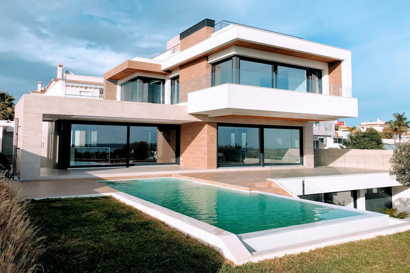 white and brown concrete building under blue sky during daytime